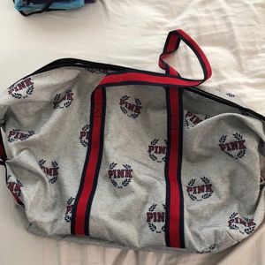 USED ONCE PINK BRAND DUFFLE BAG